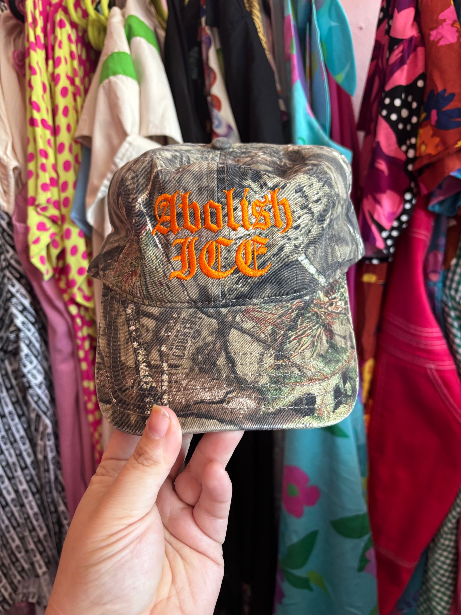 Abolish ICE Camo Hat with Orange Embroidery