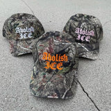 Abolish ICE Camo Hat with Orange Embroidery
