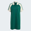 A green and white Adidas polo shirt dress featuring a green body, white collar and sleeves, green three-stripes on the sleeves, and a green trefoil logo on the chest.